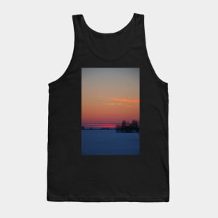 Sunset winter landscape with snow-covered road in violet and pink colors Tank Top